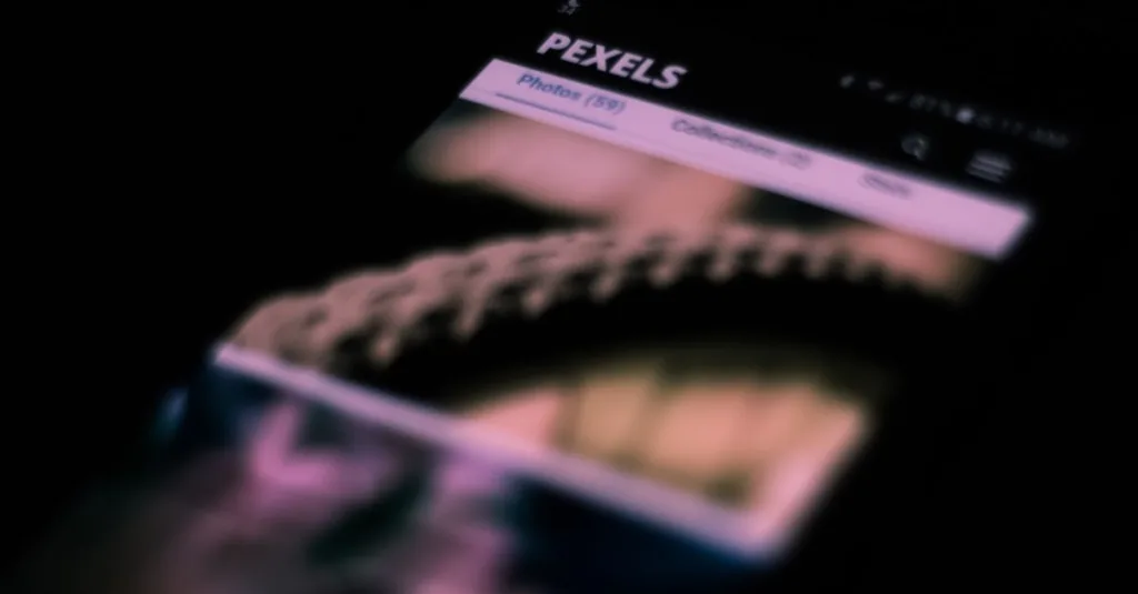 Abstract shot of a smartphone screen with blurred images and text, creating an artistic effect.